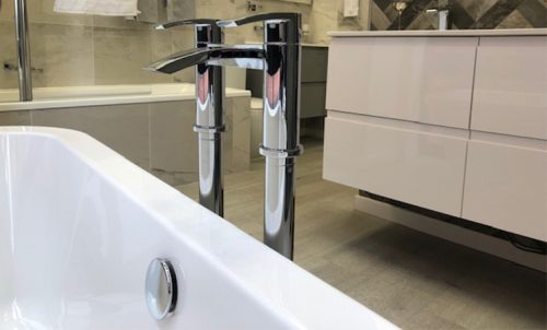 bath filler or deck mixer taps in a bathroom